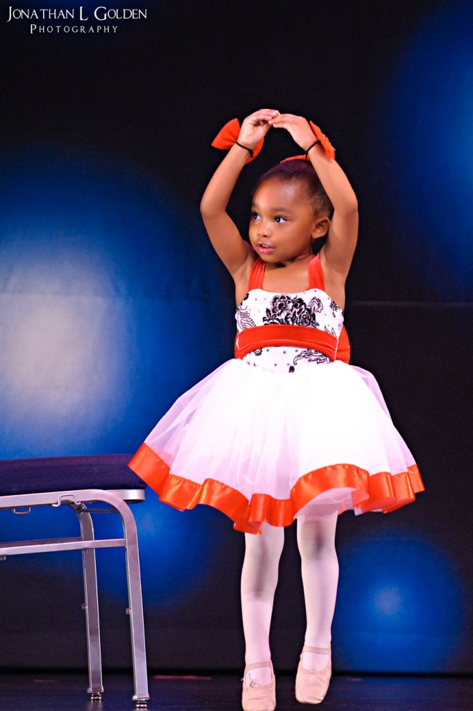 ava-recital-on-stage-twirl 